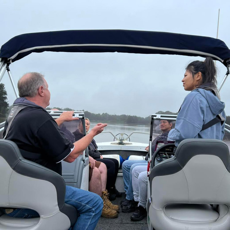 Australian Boating College Sydney Boat Trainer delivering students practical boating skills