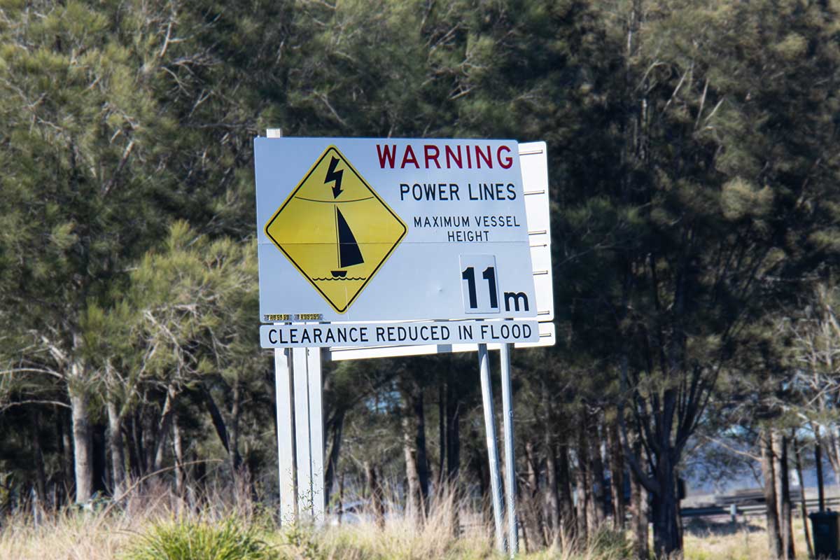 An example of a Power Line Warning Sign in the NSW Boat Theory & Test Course