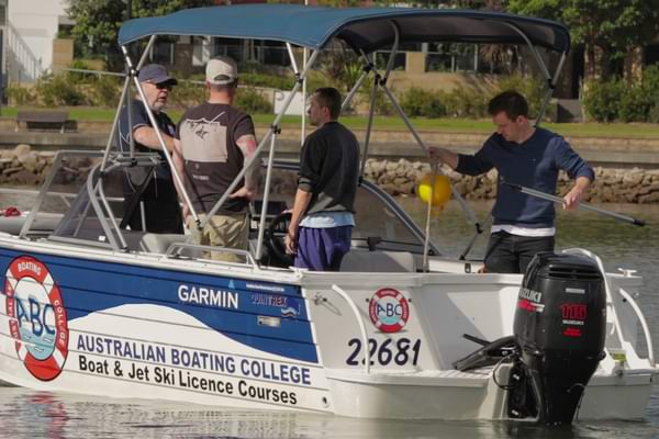 A small group of students completing a Private Boat Licence Course