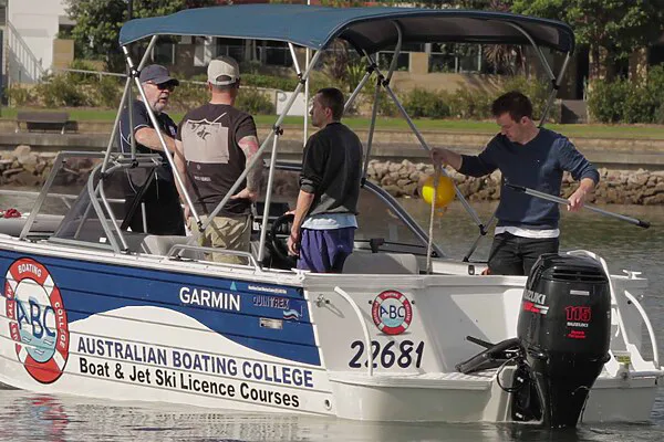 A small group of students completing a Private Boat Licence Course